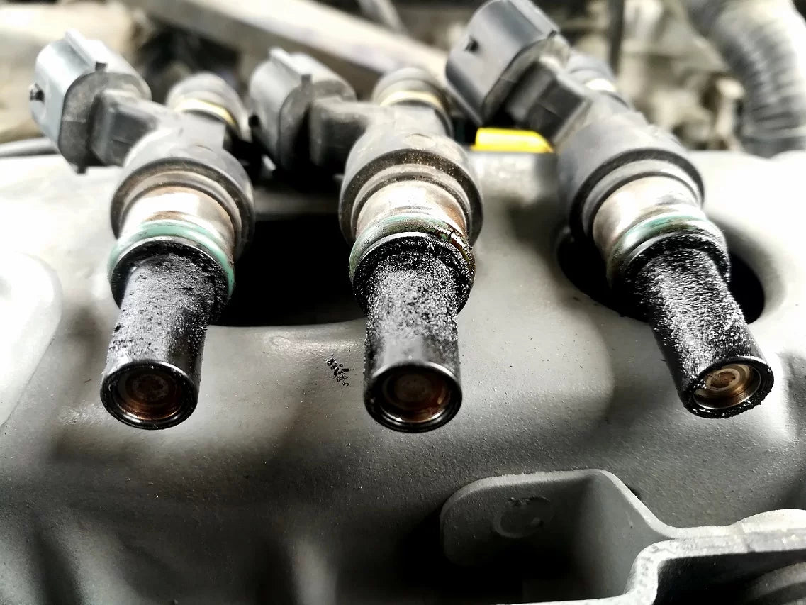 What causes fuel injectors to get clogged or dirty? – HP Injection